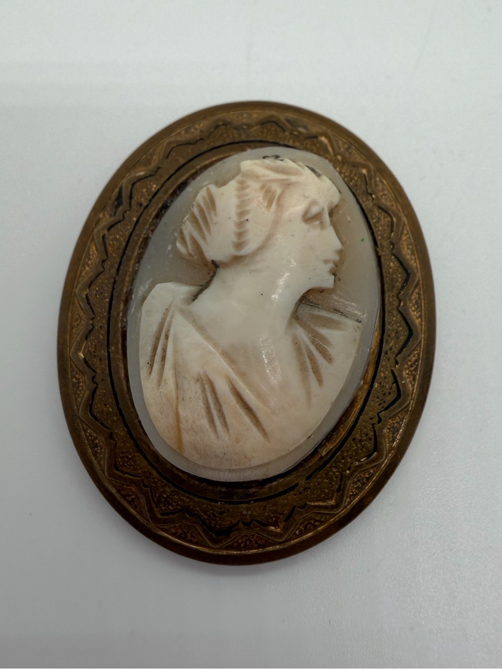 Coro brass tone cameo brooch
